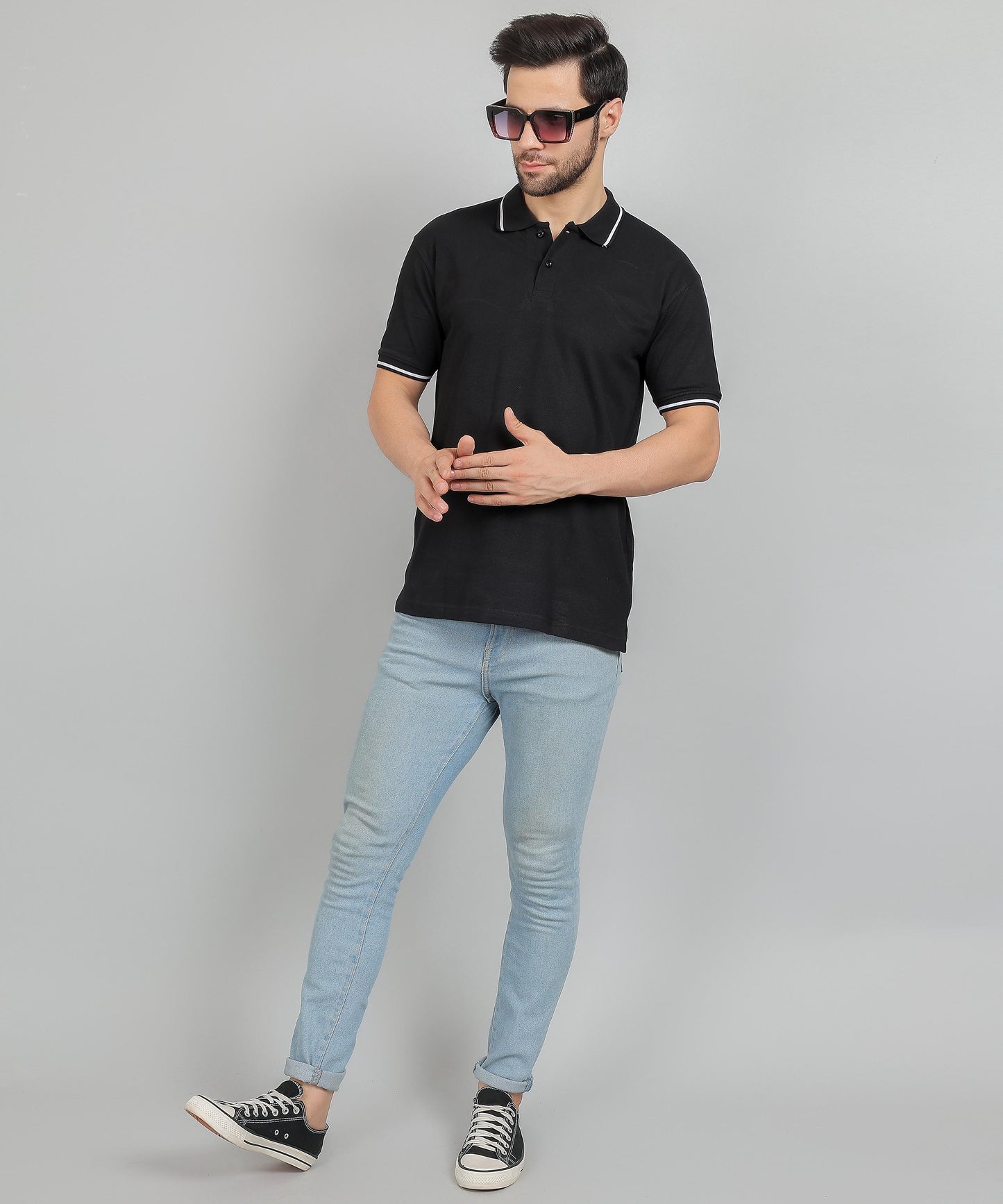 Men’s black polo t‑shirt with classic collar, button placket, and breathable cotton fabric