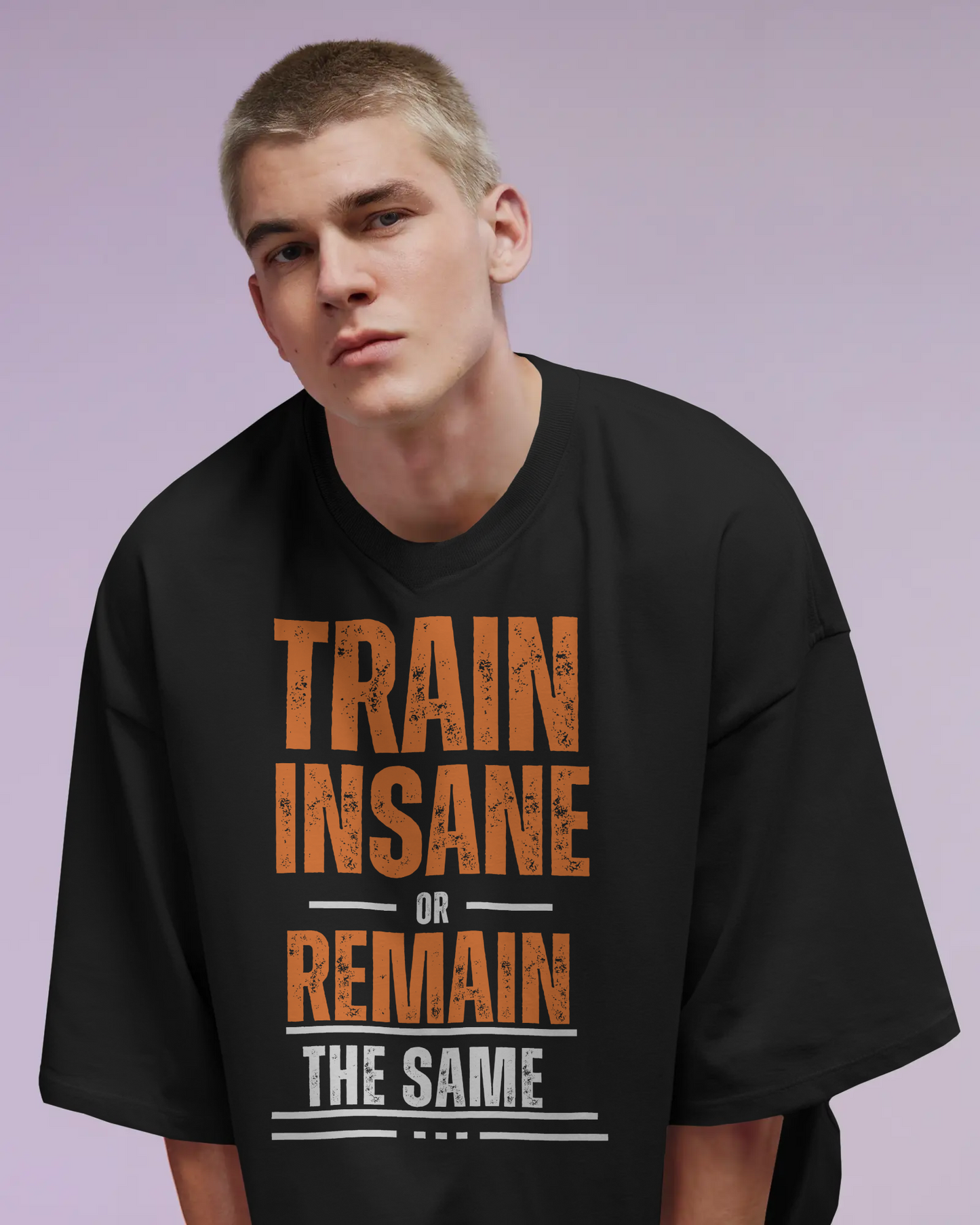 Close-up of Train bold chest print on oversized workout tee