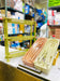 3-tier plastic storage rack with ventilated trays and caster wheels
