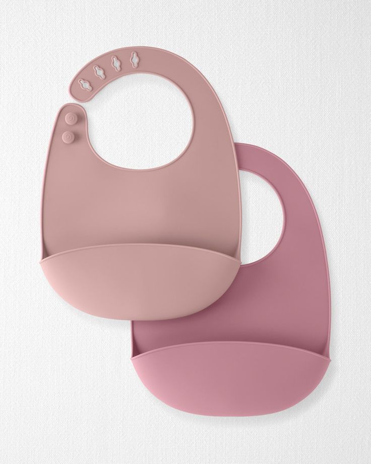 Rolled up silicone bib ready for travel with built-in food catcher