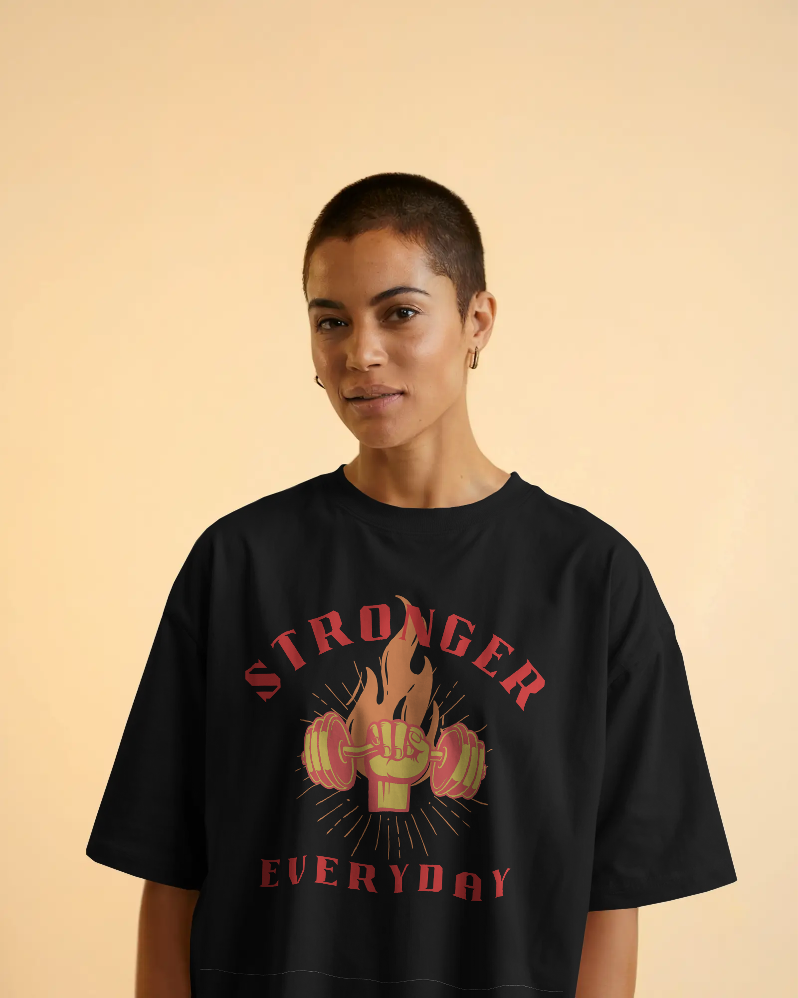Model wearing white Strong oversized t‑shirt with drop shoulder design

