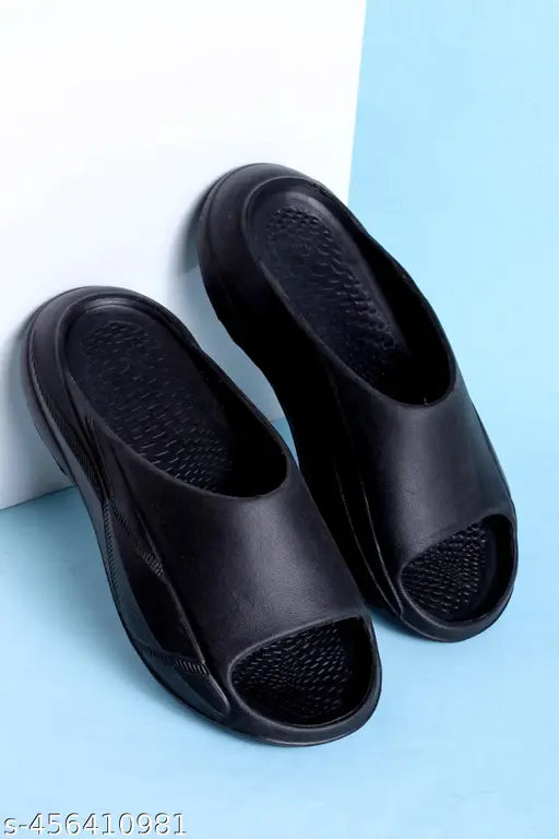 Men’s black EVA sliders with textured, non‑slip footbed and cushioned sole
